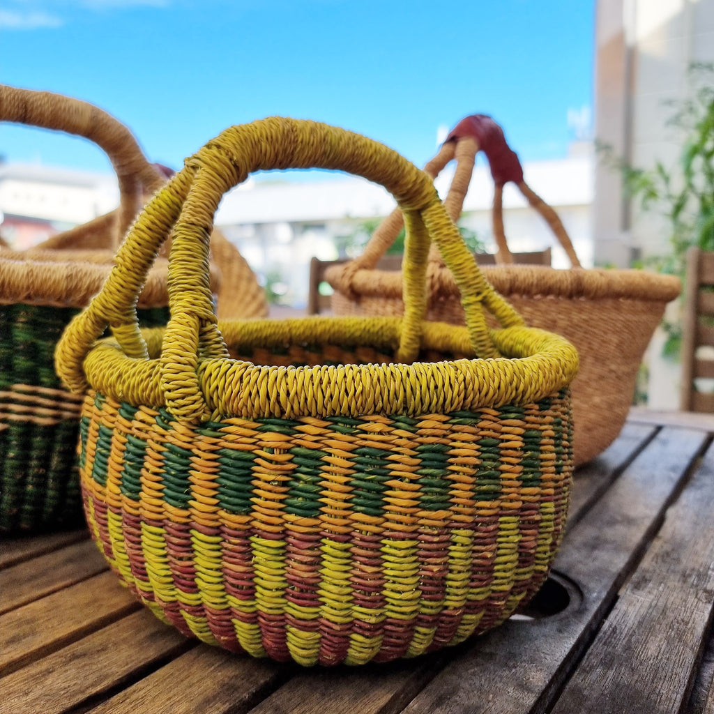 coloured round bolga basket outdoors at earth toys shop