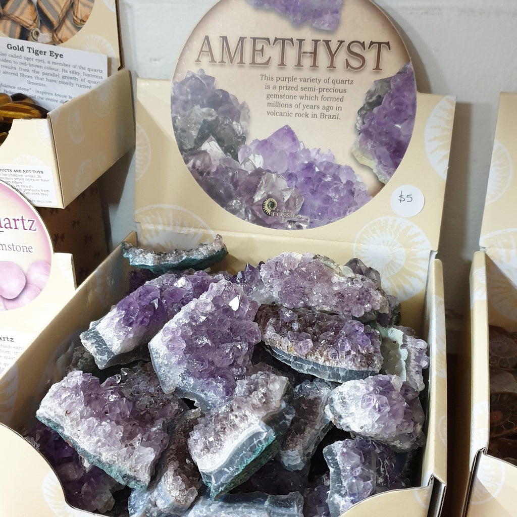 amethsyst cluster box on shelf at earth toys in cairns city