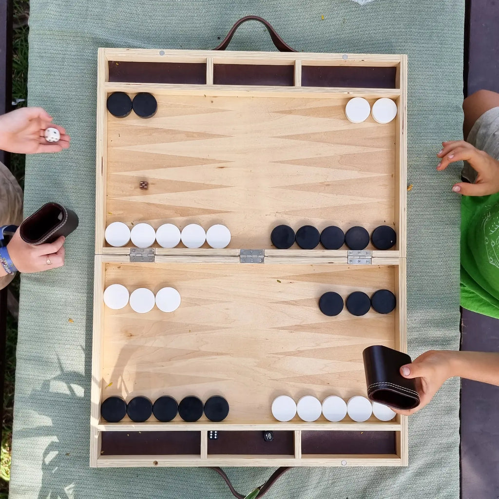 earth toys kids playing backgammon