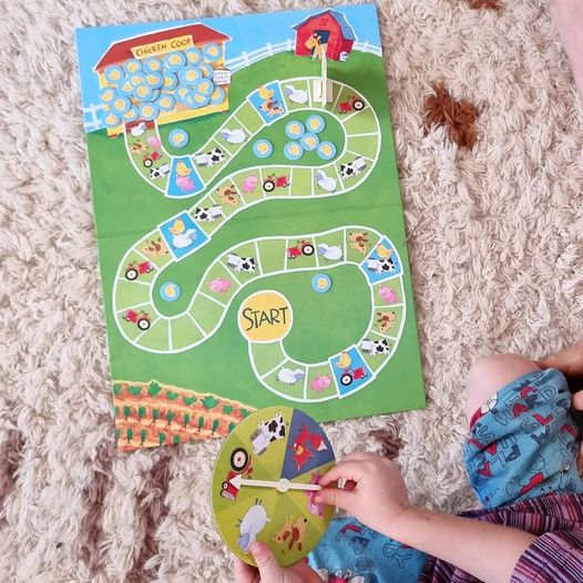 toy shop kids playing count your chickens board game by peaceable kingdom