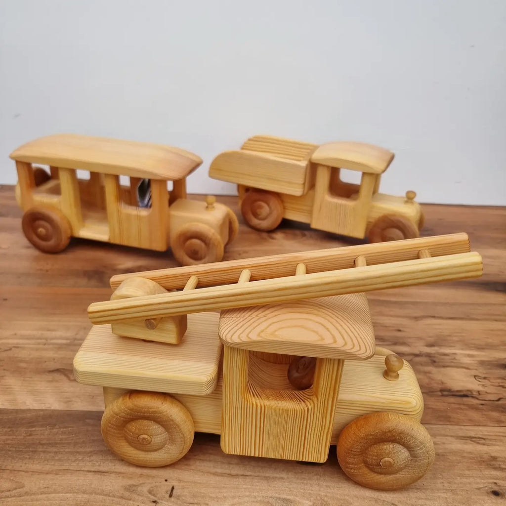 debresk wooden fire truck with other in background