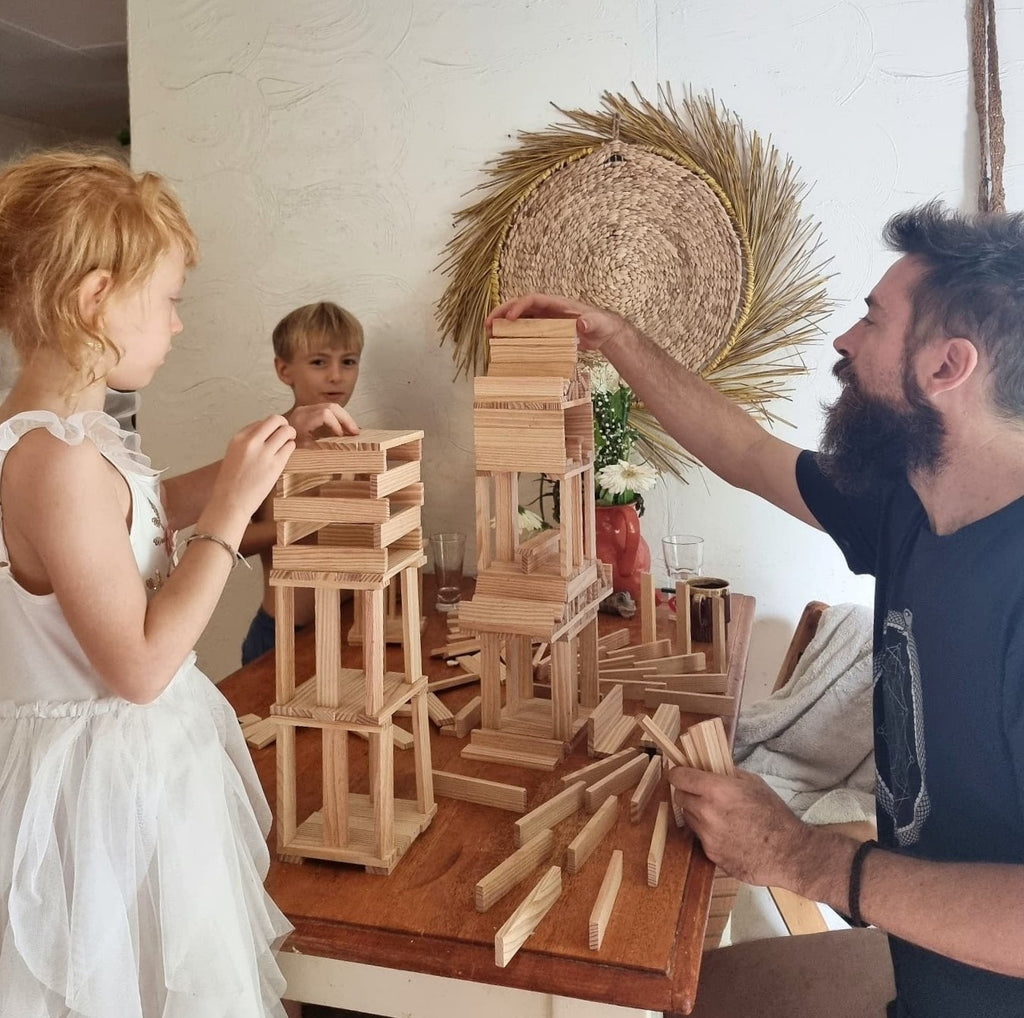 earth toys shop family creating with kapla blocks