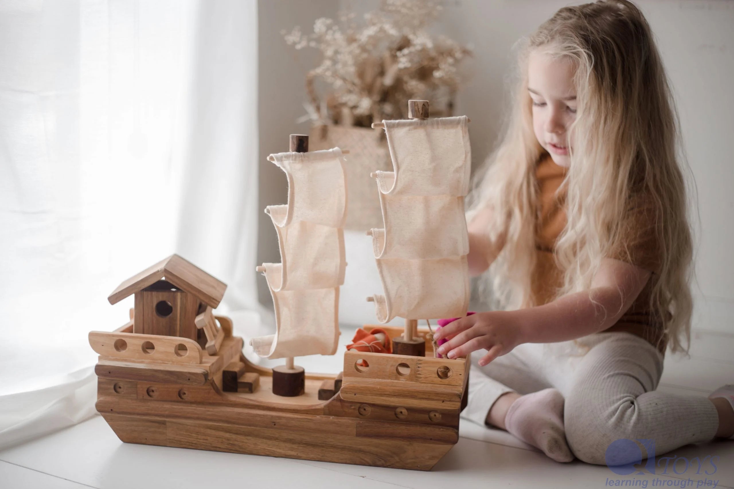 Wooden play top pirate ship